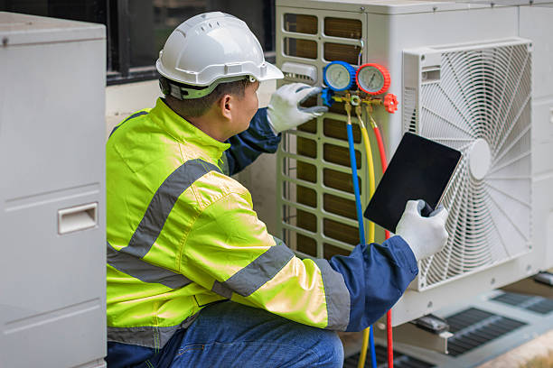 Professional Air Duct Cleaning technician working in De Witt, IA